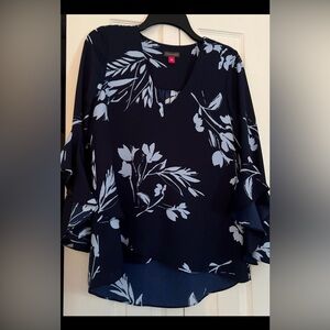 New blouse with tags.  3/4 flowy sleeves.
